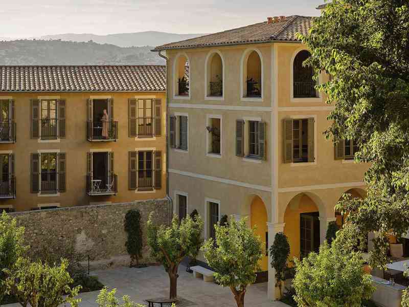 The ochre courtyard buildings of Hôtel du Couvent